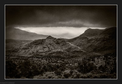 Jebel Misht lost in clouds.